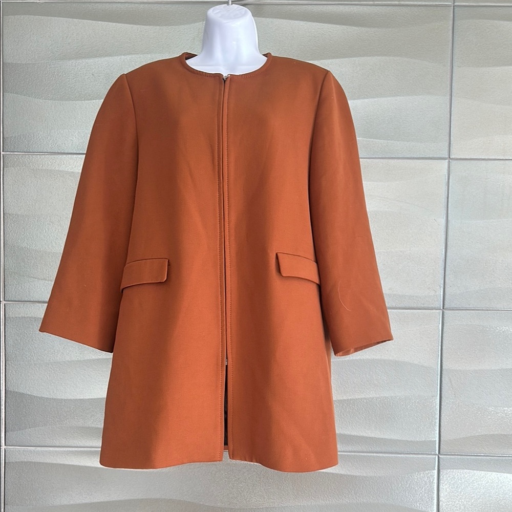 Women's Rust Orange Zip Front Coat. Beautiful color, easy to match.